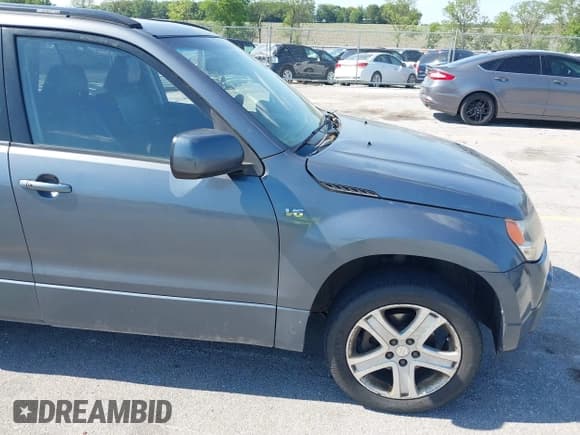 ✅ 2006 Suzuki Grand Vitara Luxury • VIN: JS3TD947264106255 • Lot: 42632638. Wystawiony na IAAI z przebiegiem 268 717 mil. Bezpłatny archiwum sprzedaży aukcyjnych z USA i szczegółowy raport historii pojazdu na DreamBid. Zdjęcie 14.
