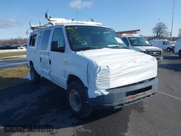 ✅ 2013 Ford Econoline Cargo Commercial • VIN: 1FTNE2EL1DDB27599 • Lot: 41878865. Listed on IAAI with 179,802 mi. Free auction sales archive from the USA and detailed vehicle history report at DreamBid. Image 1.