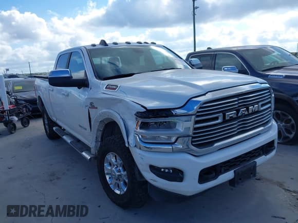 ✅ 2021 Ram 2500 Laramie • VIN: 3C6UR5FL9MG642053 • Lot: 43255509. Listed on IAAI with 83,975 mi. Free auction sales archive from the USA and detailed vehicle history report at DreamBid. Image 1.