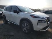 ✅ 2022 Nissan Rogue Platinum • VIN: JN8BT3DC1NW121344 • Lot: 59345535. Wystawiony na Copart z przebiegiem 60 576 mil. Bezpłatny archiwum sprzedaży aukcyjnych z USA i szczegółowy raport historii pojazdu na DreamBid. Zdjęcie 4.