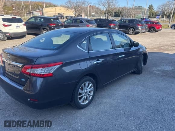✅ 2015 Nissan Sentra SV • VIN: 3N1AB7AP8FL634156 • Lot: 94070185. Listed on Copart with 175,804 mi. Free auction sales archive from the USA and detailed vehicle history report at DreamBid. Image 4.