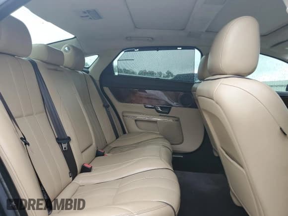 ✅ 2013 Jaguar XJ Portfolio • VIN: SAJWJ2GD0D8V46639 • Lot: 65784545. Listed on Copart with 170,529 mi. Free auction sales archive from the USA and detailed vehicle history report at DreamBid. Image 10.