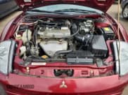 ✅ 2003 Mitsubishi Eclipse GS • VIN: 4A3AE45G23E117750 • Lot: 67090305. Wystawiony na Copart z przebiegiem 88 475 mil. Bezpłatny archiwum sprzedaży aukcyjnych z USA i szczegółowy raport historii pojazdu na DreamBid. Zdjęcie 11.