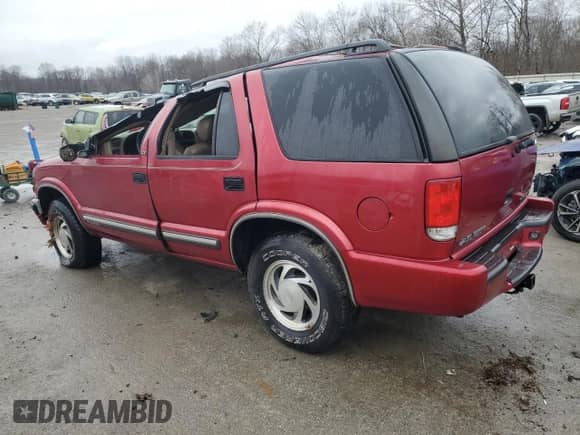 2001 Chevrolet Blazer LT z VIN 1GNDT13W012153280, wystawiony jako Copart lot #85602694 z przebiegiem 119 810 mil mil oraz Szkoda całkowita • Salvage title. Historia ofert i sprzedaży dostępna na DreamBid. Obrazek 2.