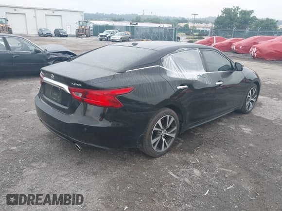 ✅ 2016 Nissan Maxima Platinum • VIN: 1N4AA6AP8GC383782 • Lot: 42668619. Listed on IAAI with 76,979 mi. Free auction sales archive from the USA and detailed vehicle history report at DreamBid. Image 4.