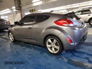 ✅ 2012 Hyundai Veloster w/Black Int • VIN: KMHTC6AD5CU071633 • Lot: 87031384. Wystawiony na Copart z przebiegiem 130 774 mil. Bezpłatny archiwum sprzedaży aukcyjnych z USA i szczegółowy raport historii pojazdu na DreamBid. Zdjęcie 2.