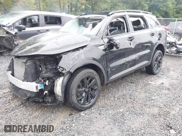 2022 Kia Sorento X-Line S z VIN 5XYRLDLC3NG085283, wystawiony jako IAAI lot #43289881 z przebiegiem 59 393 mil mil oraz . Historia ofert i sprzedaży dostępna na DreamBid. Obrazek 2.