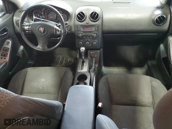 ✅ 2009 Pontiac G6 1SA • VIN: 1G2ZG57NX94223321 • Lot: 65784095. Wystawiony na Copart z przebiegiem 181 144 mil. Bezpłatny archiwum sprzedaży aukcyjnych z USA i szczegółowy raport historii pojazdu na DreamBid. Zdjęcie 8.