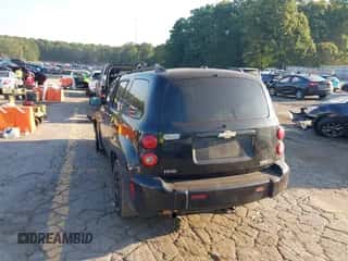 2009 Chevrolet HHR 1LT with VIN 3GNCA23B59S573802, listed as a IAAI auction lot 43133103 with 208,348 mi miles and . Bid and sale history available at DreamBid. Image 3.