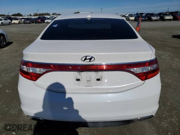 2015 Hyundai Azera z VIN KMHFG4JG1FA472859, wystawiony jako Copart lot #80162484 z przebiegiem 187 344 mil mil oraz Czysty tytuł • Clean title. Historia ofert i sprzedaży dostępna na DreamBid. Obrazek 6.