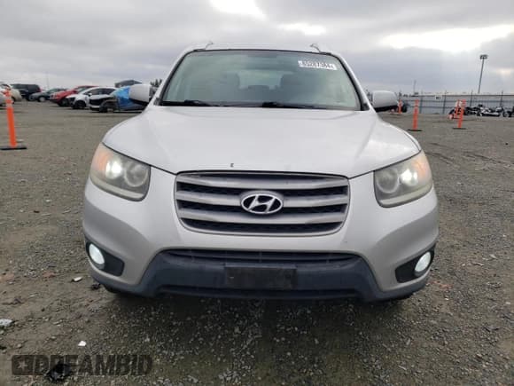 ✅ 2012 Hyundai Santa Fe SE • VIN: 5XYZHDAG7CG108357 • Lot: 85287084. Listed on Copart with 162,684 mi. Free auction sales archive from the USA and detailed vehicle history report at DreamBid. Image 5.
