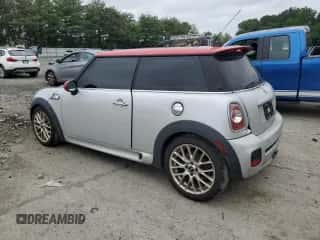 2013 MINI Hardtop John Cooper Works with VIN WMWSU9C54DT722551, listed as a Copart auction lot 61901185 with 176,413 mi miles and Salvage title. Bid and sale history available at DreamBid. Image 2.