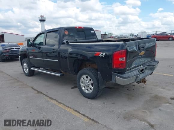 ✅ 2013 Chevrolet Silverado 2500HD LT • VIN: 1GC1KXCG6DF238504 • Lot: 42371679. Listed on IAAI with 206,794 mi. Free auction sales archive from the USA and detailed vehicle history report at DreamBid. Image 3.