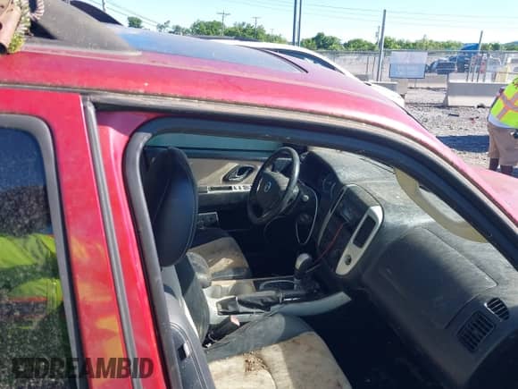 2007 Mercury Mariner Premier с VIN 4M2CU97117KJ14067, выставлен на аукционе IAAI как лот 42255709 с пробегом Не указан миль и . История ставок и продаж доступна на DreamBid. Изображение 5.