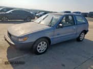 ✅ 1991 Plymouth Colt • VIN: JP3CU24A5MU016998 • Lot: 67751215. Wystawiony na Copart z przebiegiem 83 370 mil. Bezpłatny archiwum sprzedaży aukcyjnych z USA i szczegółowy raport historii pojazdu na DreamBid. Zdjęcie 1.