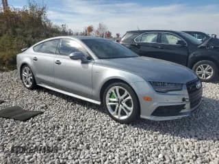 ✅ 2016 Audi S7 • VIN: WAUW2AFC5GN105817 • Lot: 76579934. Listed on Copart with 112,894 mi. Free auction sales archive from the USA and detailed vehicle history report at DreamBid. Image 4.