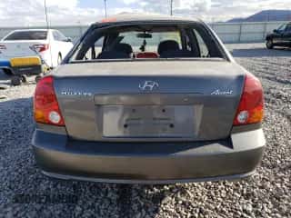 2003 Hyundai Accent GL with VIN KMHCG45CX3U482360, listed as a Copart auction lot 68657183 with Not provided miles and Salvage title. Bid and sale history available at DreamBid. Image 6.