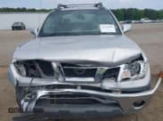 ✅ 2011 Nissan Frontier Pro-4X • VIN: 1N6AD0EV6BC427890 • Lot: 42316203. Listed on IAAI with 259,337 mi. Free auction sales archive from the USA and detailed vehicle history report at DreamBid. Image 12.