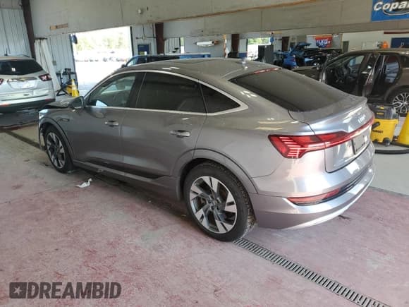 ✅ 2020 Audi e-tron Sportback Premium Plus • VIN: WA12ABGE3LB032883 • Lot: 80303745. Listed on Copart with 49,455 mi. Free auction sales archive from the USA and detailed vehicle history report at DreamBid. Image 2.