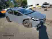 2024 Toyota Prius LE with VIN JTDADABU8R3017400, listed as a Copart auction lot 84013455 with 3,141 mi miles and Salvage title. Bid and sale history available at DreamBid. Image 4.