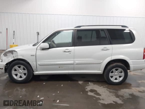 ✅ 2003 Suzuki XL7 Touring • VIN: JS3TX92V034107196 • Lot: 43475119. Wystawiony na IAAI z przebiegiem 96 987 mil. Bezpłatny archiwum sprzedaży aukcyjnych z USA i szczegółowy raport historii pojazdu na DreamBid. Zdjęcie 14.