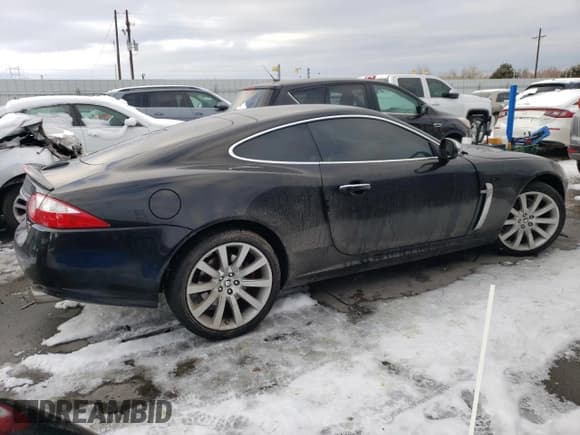 ✅ 2008 Jaguar XK • VIN: SAJWA43B485B24545 • Lot: 87680225. Listed on Copart with 133,055 mi. Free auction sales archive from the USA and detailed vehicle history report at DreamBid. Image 3.