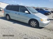 ✅ 2003 Honda Odyssey EX • VIN: 2HKRL18633H501095 • Lot: 87459365. Listed on Copart with 308,205 mi. Free auction sales archive from the USA and detailed vehicle history report at DreamBid. Image 4.