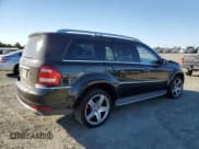✅ 2011 Mercedes-Benz GL 550 • VIN: 4JGBF8GE1BA709133 • Lot: 81930095. Listed on Copart with 242,225 mi. Free auction sales archive from the USA and detailed vehicle history report at DreamBid. Image 3.