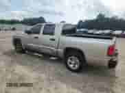2005 Dodge Dakota ST z VIN 1D7HE28N95S184470, wystawiony jako Copart lot #64811095 z przebiegiem 110 416 mil mil oraz Szkoda całkowita • Salvage title. Historia ofert i sprzedaży dostępna na DreamBid. Obrazek 2.