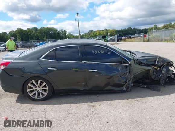 2016 Chevrolet Malibu LTZ z VIN 1G11E5SA4GU105094, wystawiony jako IAAI lot #43108630 z przebiegiem 105 242 mil mil oraz . Historia ofert i sprzedaży dostępna na DreamBid. Obrazek 13.