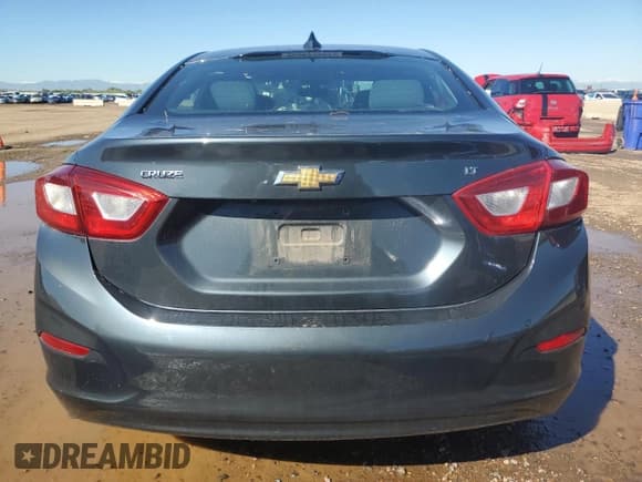 ✅ 2018 Chevrolet Cruze LT • VIN: 1G1BE5SM1J7155018 • Лот: 81802705. Опубликован ранее на Copart с пробегом 87 489 миль. Бесплатный доступ к архиву аукционных продаж из США и подробный отчёт об истории автомобиля на DreamBid. Изображение 6.