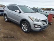 ✅ 2016 Hyundai Santa Fe • VIN: 5XYZWDLA9GG309133 • Lot: 43429006. Listed on IAAI with 125,931 mi. Free auction sales archive from the USA and detailed vehicle history report at DreamBid. Image 1.