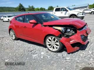 2013 Hyundai Veloster w/Gray Int z VIN KMHTC6ADXDU117233, wystawiony jako Copart lot #57247064 z przebiegiem 129 810 mil mil oraz Szkoda całkowita • Salvage title. Historia ofert i sprzedaży dostępna na DreamBid. Obrazek 4.