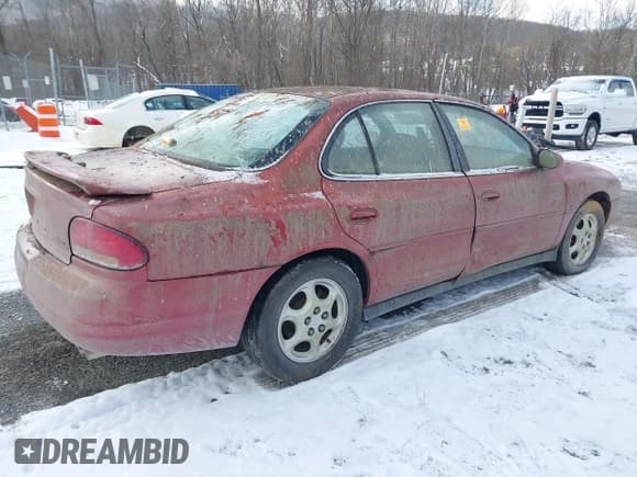 ✅ 1999 Oldsmobile Intrigue GL • VIN: 1G3WS52KXXF335273 • Lot: 41624543. Listed on IAAI with 106,606 mi. Free auction sales archive from the USA and detailed vehicle history report at DreamBid. Image 4.