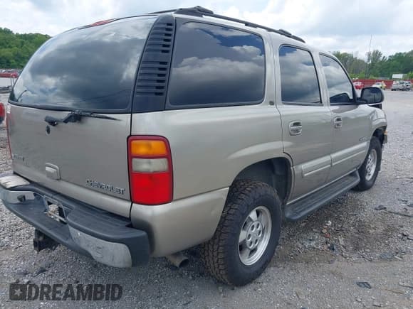 ✅ 2003 Chevrolet Tahoe LS • VIN: 1GNEC13Z93R191440 • Lot: 42627274. Listed on IAAI with 272,039 mi. Free auction sales archive from the USA and detailed vehicle history report at DreamBid. Image 4.