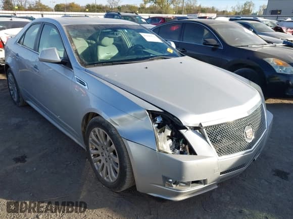 ✅ 2010 Cadillac CTS Performance • VIN: 1G6DJ5EG9A0125603 • Lot: 43660521. Listed on IAAI with 245,240 mi. Free auction sales archive from the USA and detailed vehicle history report at DreamBid. Image 1.