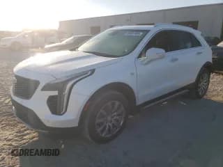 ✅ 2019 Cadillac XT4 FWD Premium Luxury • VIN: 1GYFZCR40KF118311 • Lot: 86881485. Listed on Copart with 52,788 mi. Free auction sales archive from the USA and detailed vehicle history report at DreamBid. Image 1.