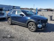 ✅ 2022 Mazda CX-30 S Preferred • VIN: 3MVDMBCL8NM410202 • Lot: 91819235. Listed on Copart with 23,526 mi. Free auction sales archive from the USA and detailed vehicle history report at DreamBid. Image 4.