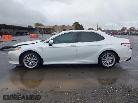 ✅ 2018 Toyota Camry Hybrid SE • VIN: 4T1B21HK0JU005414 • Lot: 43715775. Listed on IAAI with 176,737 mi. Free auction sales archive from the USA and detailed vehicle history report at DreamBid. Image 15.