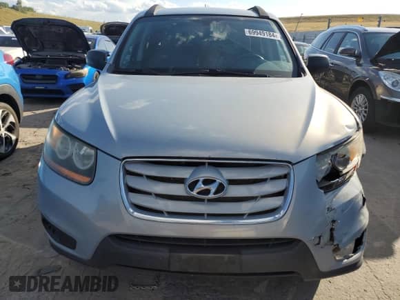 2010 Hyundai Santa Fe GLS с VIN 5NMSGDAB4AH415674, выставлен на аукционе Copart как лот 69949184 с пробегом 225 158 миль миль и Списание • Salvage title. История ставок и продаж доступна на DreamBid. Изображение 5.