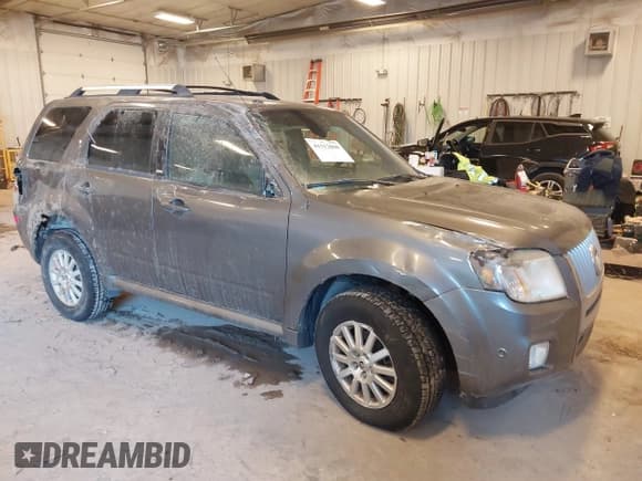 ✅ 2010 Mercury Mariner Premier • VIN: 4M2CN9HGXAKJ11983 • Lot: 41512060. Listed on IAAI with 154,971 mi. Free auction sales archive from the USA and detailed vehicle history report at DreamBid. Image 1.