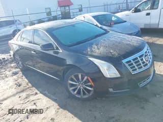 ✅ 2015 Cadillac XTS Livery • VIN: 2G61U5S39F9162742 • Lot: 41881325. Listed on IAAI with 171,155 mi. Free auction sales archive from the USA and detailed vehicle history report at DreamBid. Image 1.
