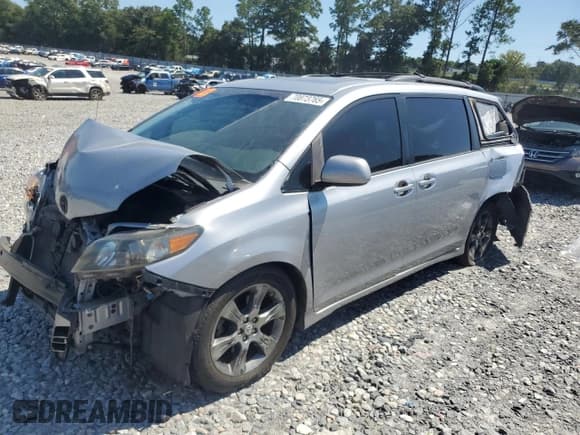 ✅ 2012 Toyota Sienna SE • VIN: 5TDXK3DC9CS183950 • Lot: 70873765. Listed on Copart with 180,359 mi. Free auction sales archive from the USA and detailed vehicle history report at DreamBid. Image 1.