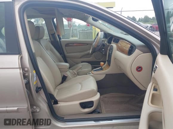 ✅ 2005 Jaguar X-Type 3.0L • VIN: SAJWA51A25WE63097 • Lot: 42701254. Listed on IAAI with 77,199 mi. Free auction sales archive from the USA and detailed vehicle history report at DreamBid. Image 5.