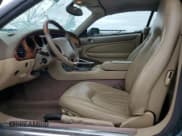 ✅ 1999 Jaguar XK • VIN: SAJGX2048XC039096 • Lot: 62523995. Wystawiony na Copart z przebiegiem 77 814 mil. Bezpłatny archiwum sprzedaży aukcyjnych z USA i szczegółowy raport historii pojazdu na DreamBid. Zdjęcie 7.