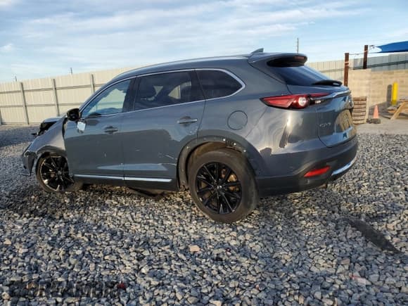 ✅ 2021 Mazda CX-9 Grand Touring • VIN: JM3TCADYXM0517720 • Лот: 92196945. Опубликован ранее на Copart с пробегом 77 213 миль. Бесплатный доступ к архиву аукционных продаж из США и подробный отчёт об истории автомобиля на DreamBid. Изображение 2.