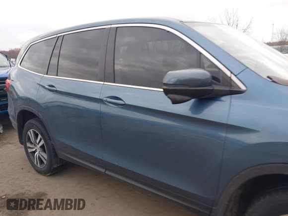 ✅ 2017 Honda Pilot EX-L • VIN: 5FNYF6H5XHB001772 • Lot: 43771030. Listed on IAAI with 126,659 mi. Free auction sales archive from the USA and detailed vehicle history report at DreamBid. Image 13.