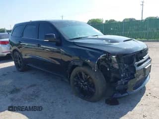 2018 Dodge Durango R/T with VIN 1C4SDJCT9JC292059, listed as a IAAI auction lot 42325816 with 128,522 mi miles and . Bid and sale history available at DreamBid. Image 1.