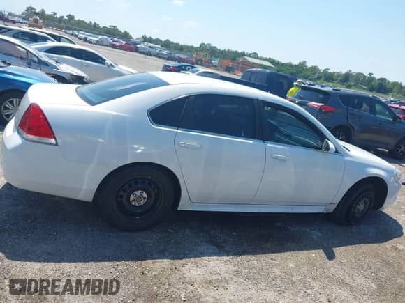 ✅ 2013 Chevrolet Impala Police • VIN: 2G1WD5E35D1221501 • Lot: 43269727. Listed on IAAI with 95,859 mi. Free auction sales archive from the USA and detailed vehicle history report at DreamBid. Image 13.