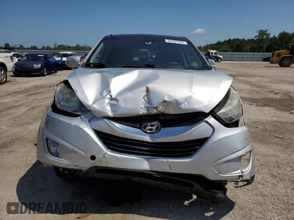 2013 Hyundai Tucson Limited z VIN KM8JUCAC9DU557664, wystawiony jako Copart lot #53707934 z przebiegiem 148 967 mil mil oraz Szkoda całkowita • Salvage title. Historia ofert i sprzedaży dostępna na DreamBid. Obrazek 5.